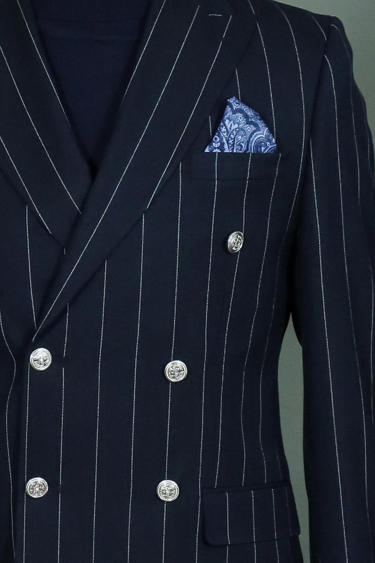 Pinstripe Double-Breasted Navy Suit and Knitwear Look for Office Elegance