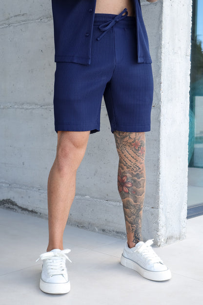THE SLIM PLEATED SHORTS  - NAVY BLUE